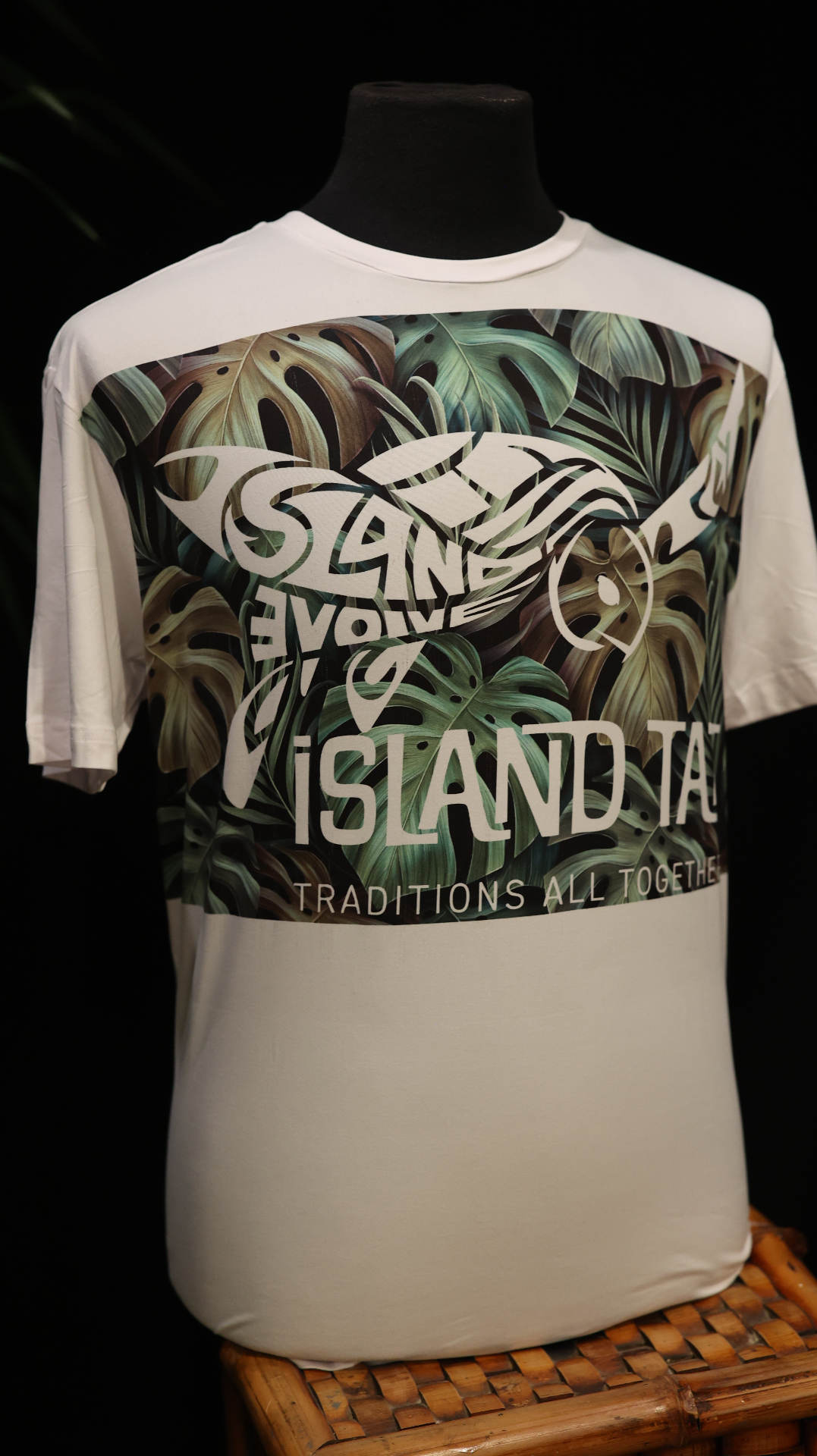 White performance shirt with a large full-color front print, photographed in the IslandTAT studio.